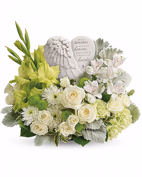 White rose bouquet with an angel wing keepsake featuring a comforting inscription.